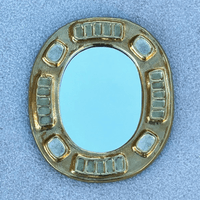 " Mérida" gilt ceramic and crystallized glass mirror, Mithé Esplelt, circa 1955.