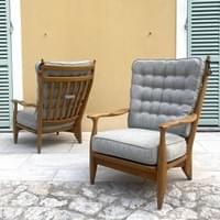 Pair of " Edouard" oak lounge chairs. Guillerme et Chambon, France 1950's
