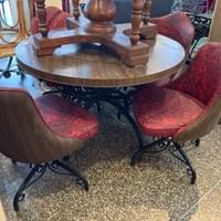 $395 70's laminate table and 4 vinyl chairs