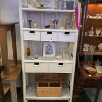 White rattan shelf with drawers $695 36" x 17.5" 73"