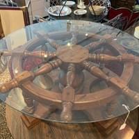 $250 glass top ships wheel coffee table 42"  x 18"