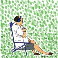 man drinking mate by the sea