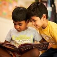 Two children reading together