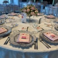 Classic style table setting feature silver and pink and low centerpiece 