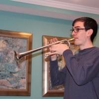 Adam Practicing at a beach house