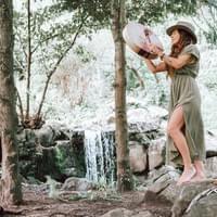 Man on a boat: Behind Taj Mahal in Agra, India. 