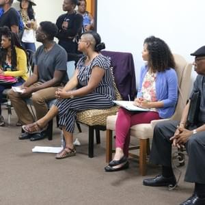 Panelists listen to audience members during the Q&A section of the workshop.