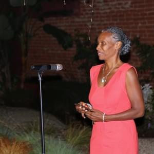 Monique Ruffin, NAMI Urban LA's Social Media Coordinator, listening to all the breakout groups share what they discussed.