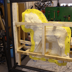 The completed mold mounted in the custom built gyroscopic rig which was used to create the casting. 