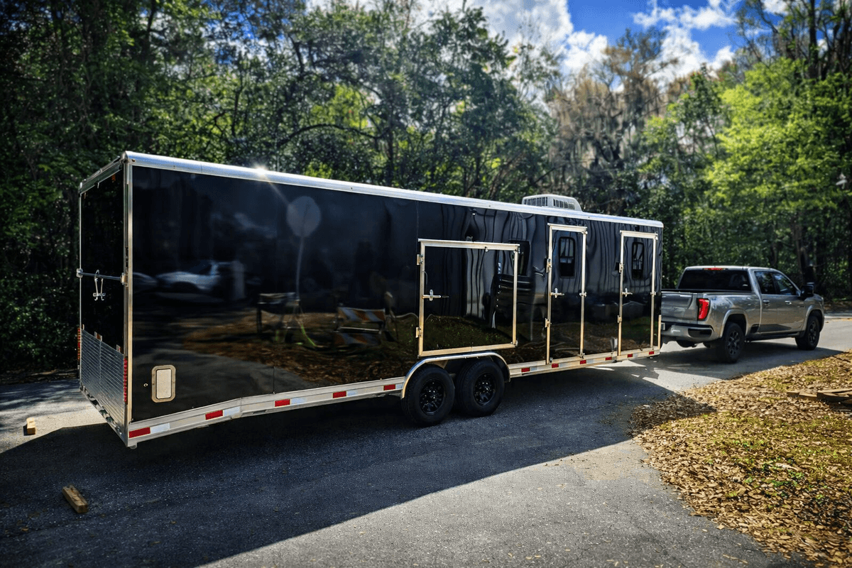Large custom black enclosed aluminum trailer