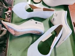 Upper and insole preparation for a suede high heel pump — Made in Italy shoe manufacturing.