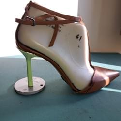 First prototype fitting — Italian footwear development in progress.