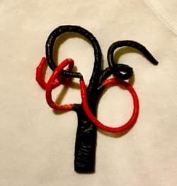 Brooch made from Plastic bags over electrical wiring