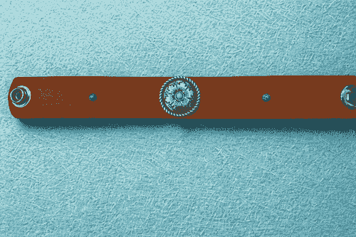 Hand stamped bracelet with concho