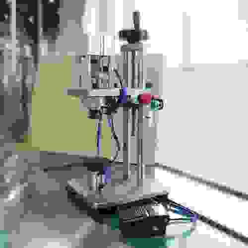 Pneumatic perfume crimping machine