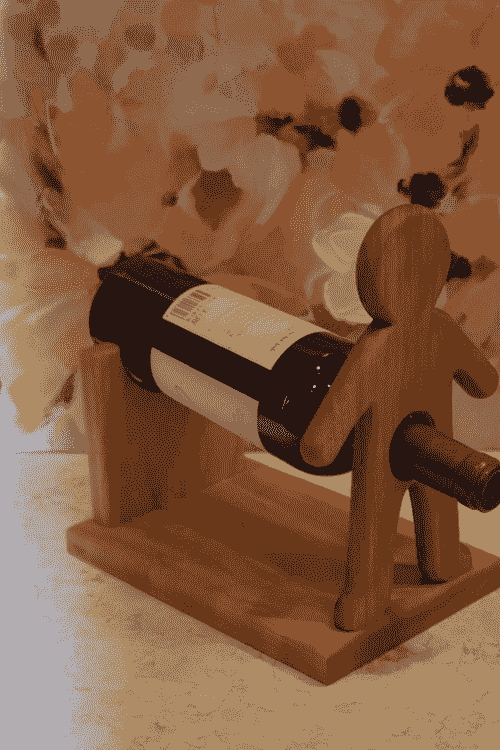 NOVELTY WINE HOLDER