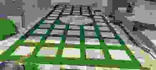 Artificial grass with stepping stones