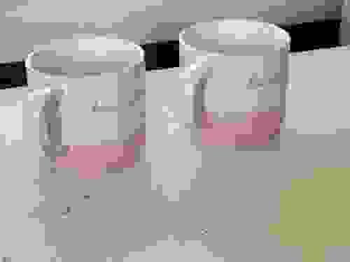2 Pink and White Mugs