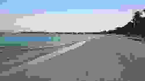 sunset in long sandy beach of oldfort