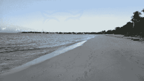 sunset in long sandy beach of oldfort