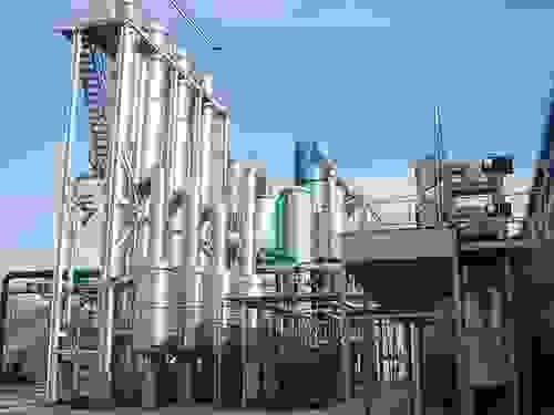 Falling film vacuum evaporator