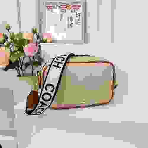 Coach doble zipper