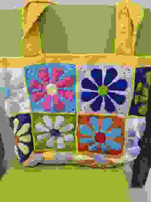Colorful flowers crochet Bag in yellow hue