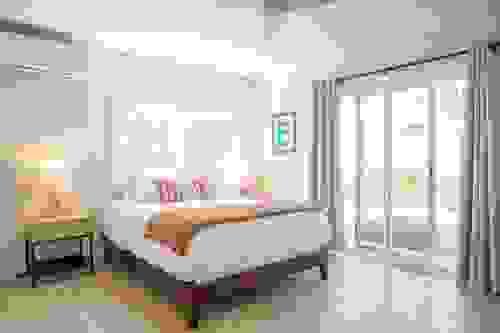 Private room with bathroom and outside sitting area.