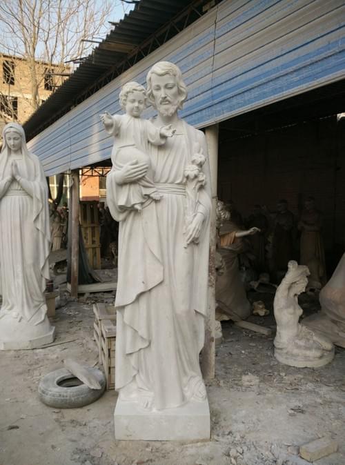 Life size marble Joseph with a child for church usage