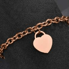 Pulsera con dije corazón oro rosa de acero inoxidable