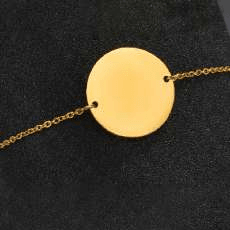 Pulsera plata con placa circular