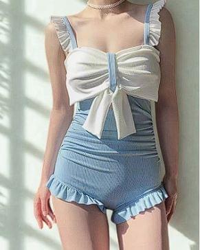 Ruffled Swimsuit with Bow and Open-Back Design