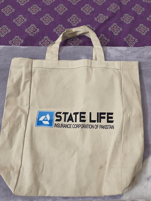 White bag with state life insurance corporation of Pakistan text