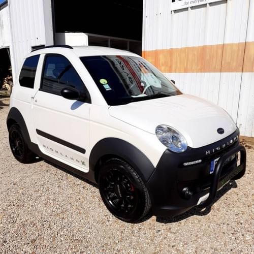 MICROCAR M.GO HIGHLAND X – ÉDITION BLANCHE AVEC PARE-BUFFLE
