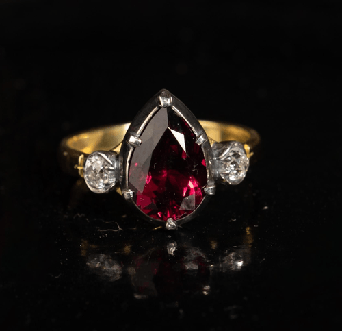 18ct Gold and Silver Ring with Pear‑Shaped Garnet and Antique‑Cut Diamonds