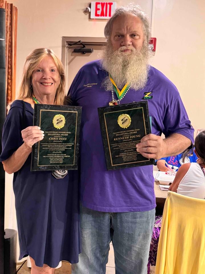 Zelotopians Chris Dees and Kenneth Young holding their plaques Zelotopians Chris Dees and Kenneth Young holding their plaques