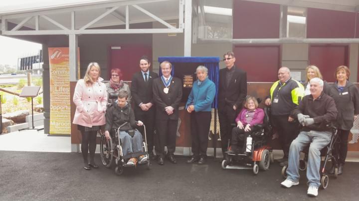 A group of people in front of the first Changing Places toilet in Ringwood Lake Park in 2014