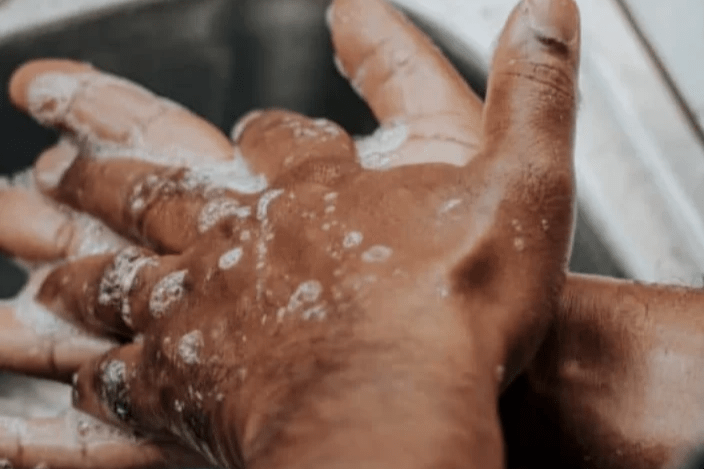 person washing hands