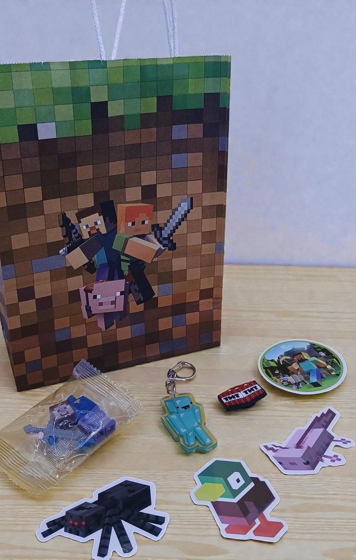 Minecraft themed party bag with keyring shoe charm Lego figure and stickers
