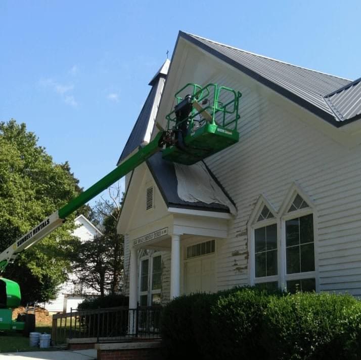 Bj's Painting Company, Inc. pressure washed and painting a church property .