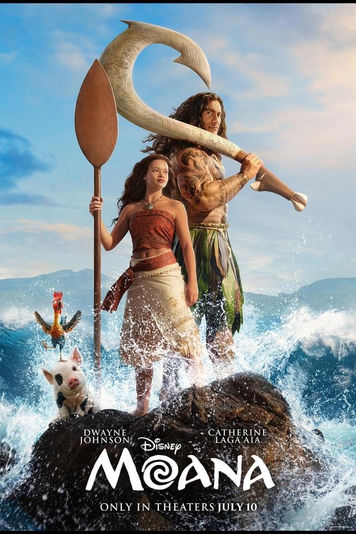 Photograph of two characters from the Disney movie Moana standing on a rock with ocean waves splashing around them, holding a paddle and a large fishhook. The scene includes a rooster and a pig, with a bright sky and distant mountains in the background, promoting the film's theatrical release date.