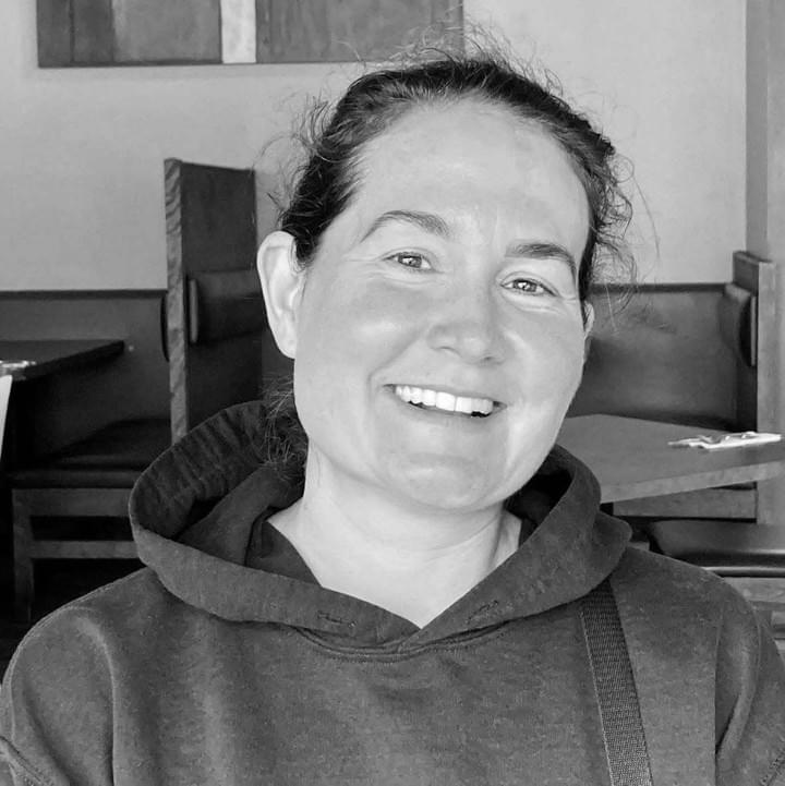 Angie Landry is a professional writer and storyteller who works at the intersection of story, power, and the ways people come back to themselves. She holds a master's degree in Gender, Sexuality and Women's Studies, with a focus on feminist political economy, where her work examined unpaid and invisible labour, including care work and emotional labour.