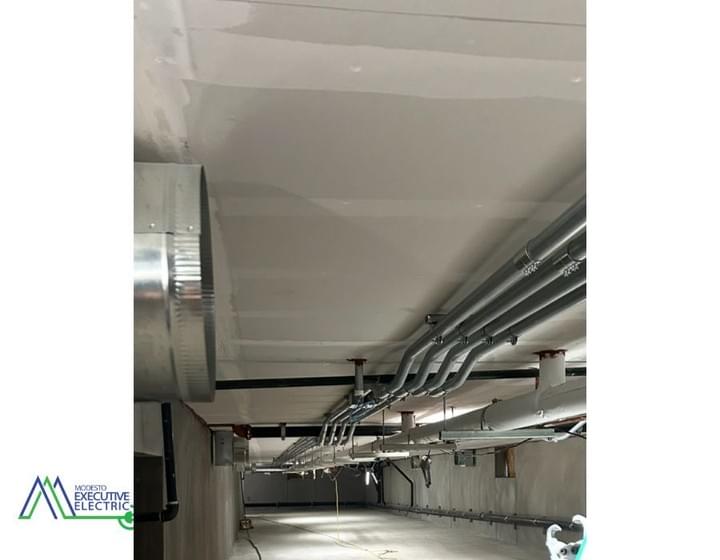 HVAC and lighting electrical work in converted university dormitory building Stockton California