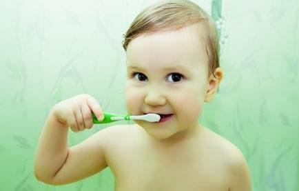 Image Of Baby Brushing Teeth