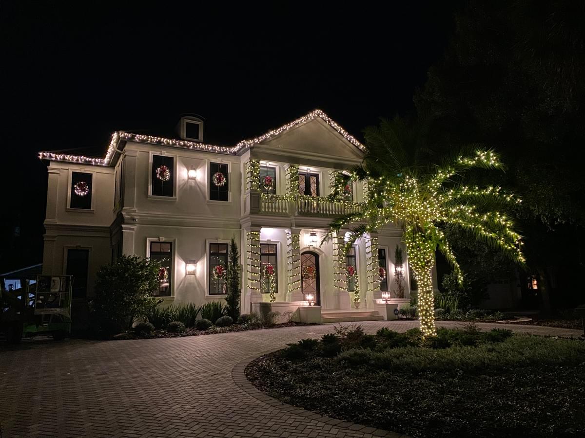 Tampa home glowing with professional residential Christmas lights