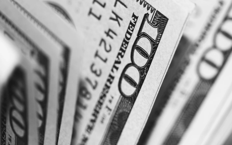 Closeup photo of hundred dollars bills