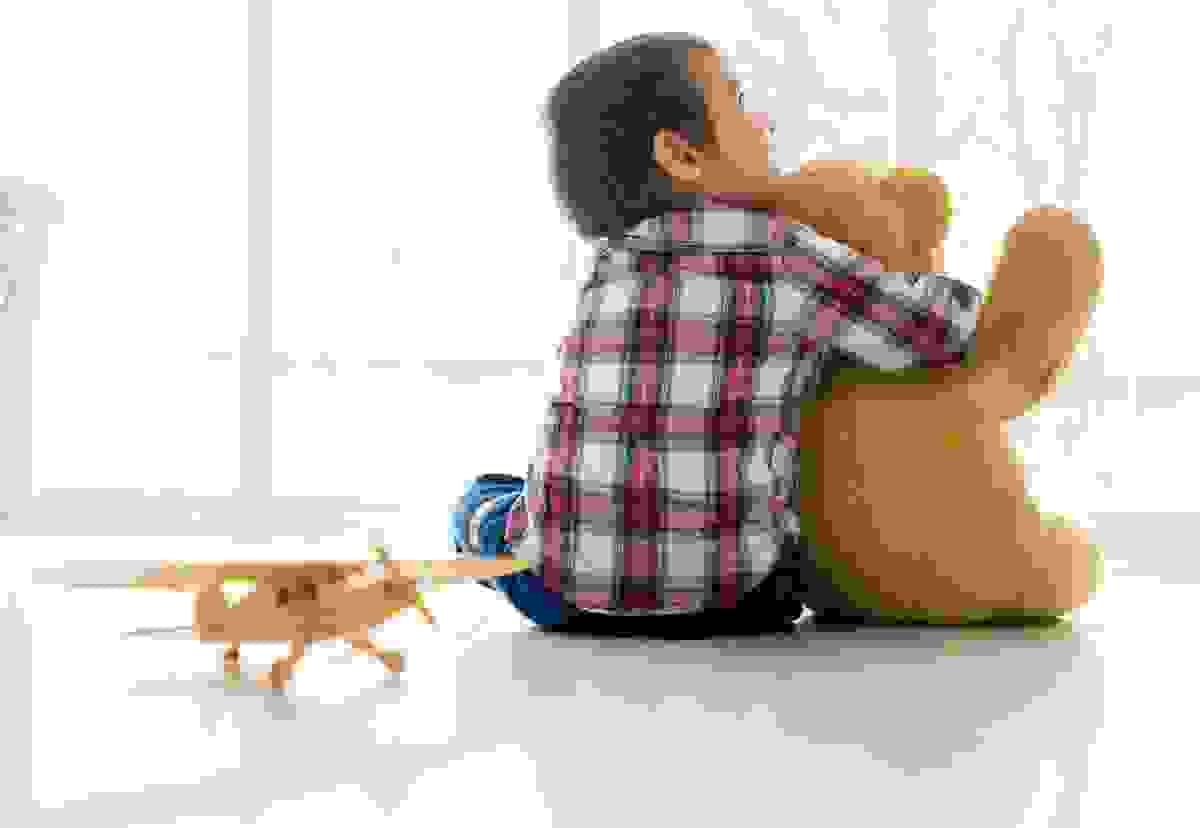 Autistic Young Boy on Compounded Medications from InHealth Specialty Pharmacy Holding Teddy Bear Autistic Young Boy on Compounded Medications from InHealth Specialty Pharmacy Holding Teddy Bear