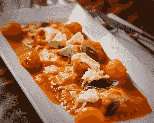 Fresh mozzarella served with tomatoes, basil and pasta in a restaurant dish. Fresh mozzarella served with tomatoes, basil and pasta in a restaurant dish.