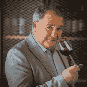 Gary Knight, wine expert holding a glass of red wine Gary Knight, wine expert holding a glass of red wine