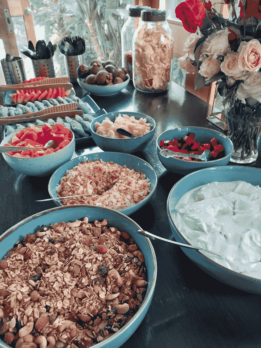 DIY granola bowls and fresh fruit at the breakfast buffet at Spaces Bali DIY granola bowls and fresh fruit at the breakfast buffet at Spaces Bali
